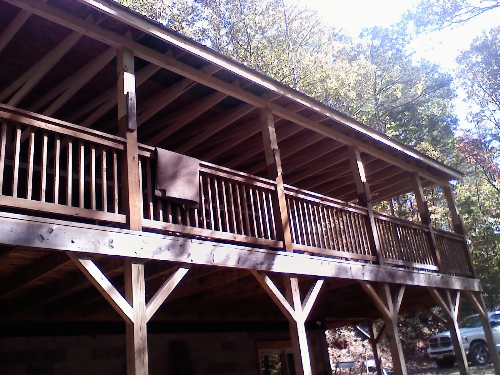 Timber framing under a new elevated porch and deck — Roof Leak Repair in Hinesville by Roofing Brothers